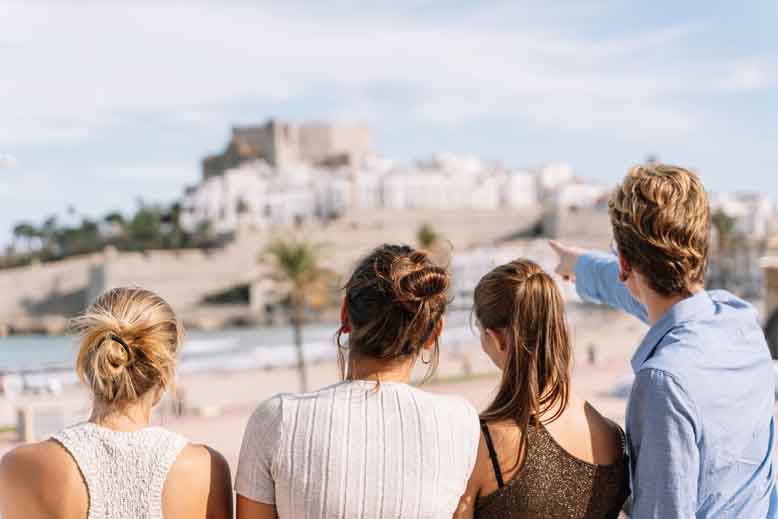 group of people on their travels looking out at landscape