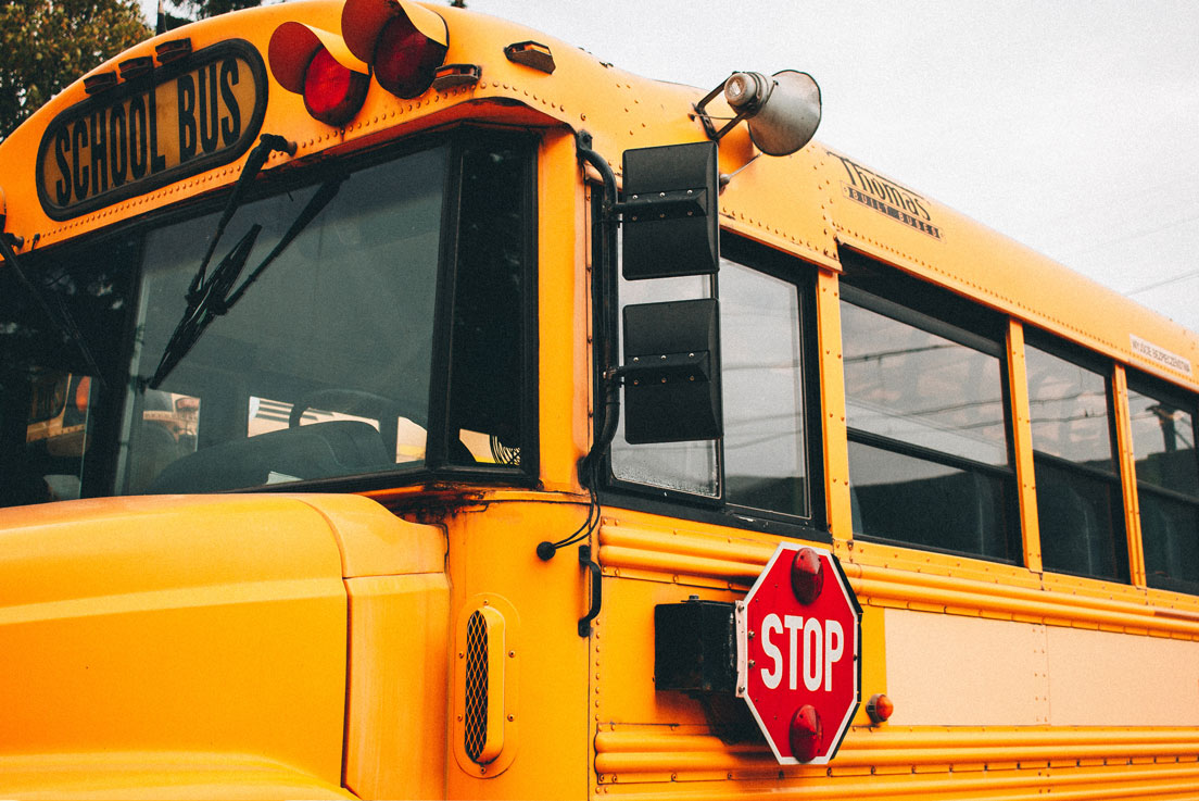 school bus with stop sign
